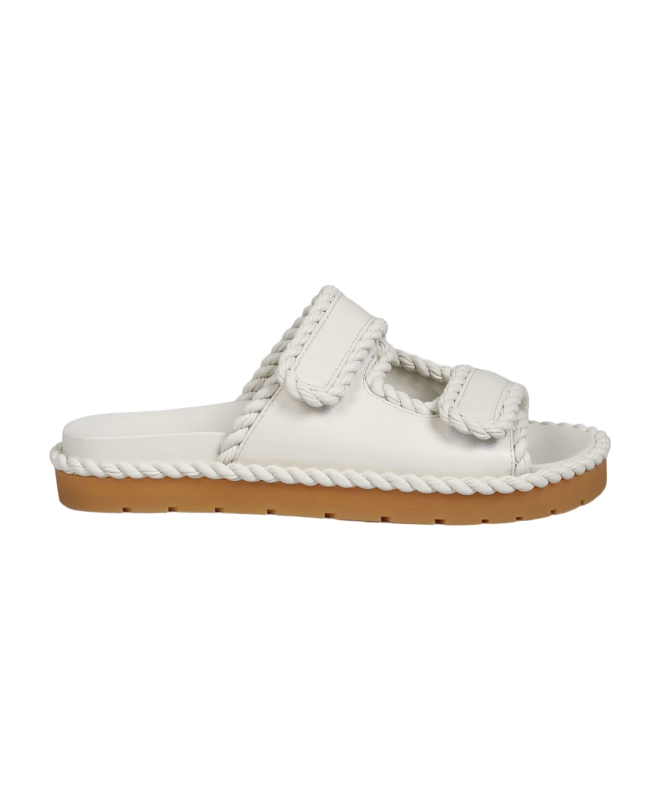 BOTTEGA VENETA 26S FLAT MULES IN BLACK LAMBSKIN