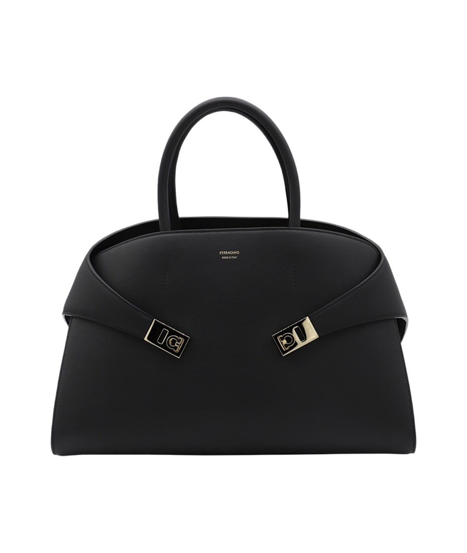 FERRAGAMO ブラックレザー ハグ L トップハンドルバッグ 関税込 Hug ハンドバッグ (L) - ウィメンズ | Ferragamo