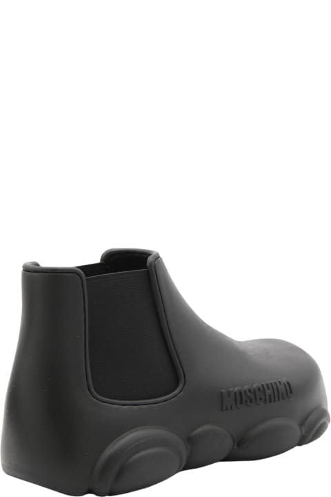 ウィメンズ新着アイテム Moschino Black Rubber Gummy Boots
