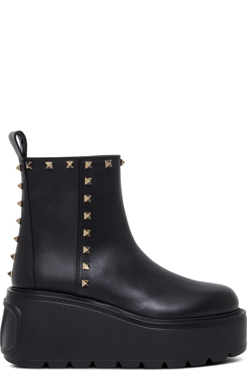 Uniqueform Studded Leather Boots With Oversize Sole