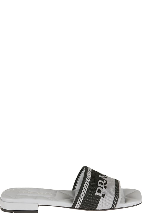 Prada Logo Embroidered Quilt Effect Flat Sandals - NERO + BIANCO