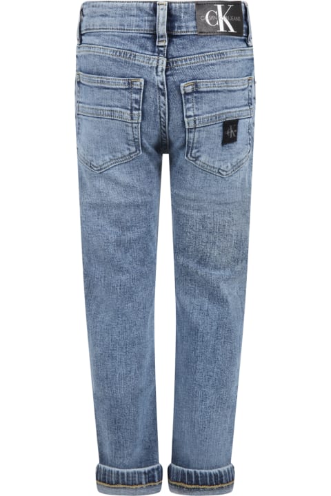 Light-blue Jeans For Boy With Black Patch Logo