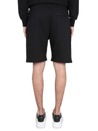 パンツ ALEXANDER MCQUEEN Women Shorts  Burmudas 798018QJAEI1124 GR Alexander McQueen Bermuda Shorts With Graffiti Logo Print