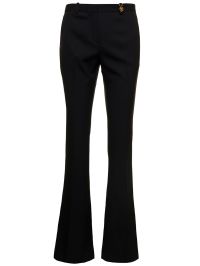 Ribbed-knit wool-blend flared pants in black - Versace