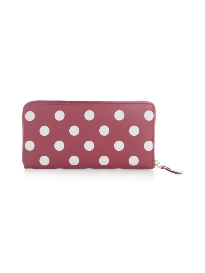 comme des garcons zip around wallet pattern