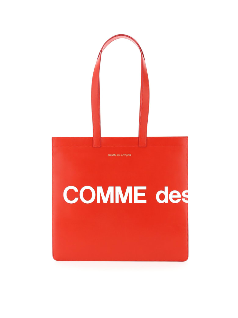 orange comme des garçons shirt