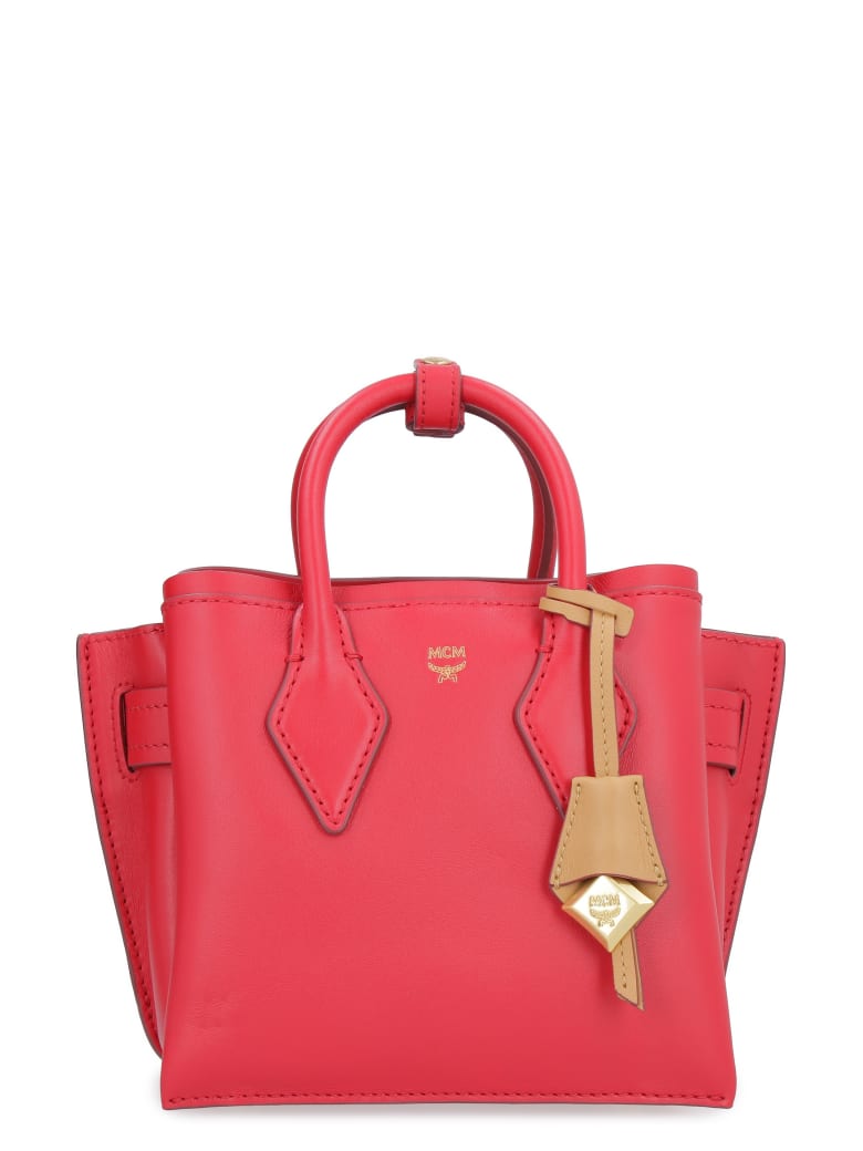 red mcm tote bag