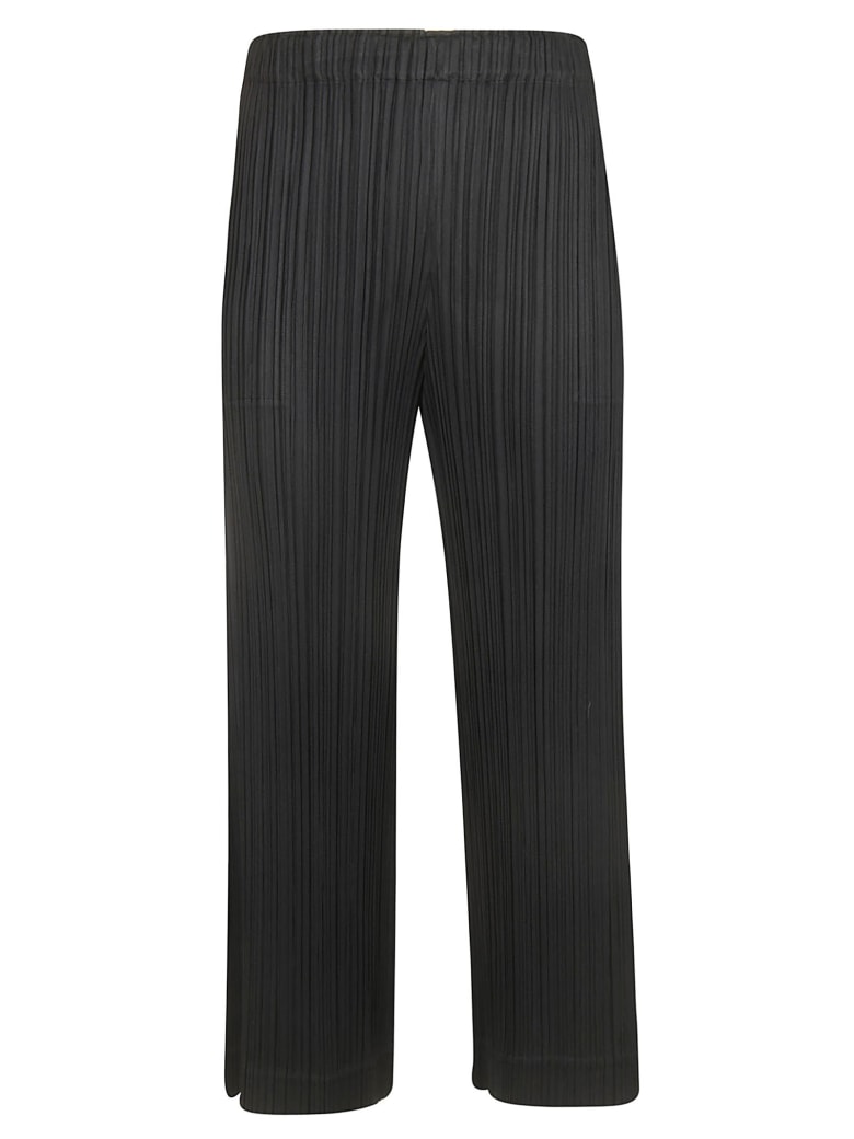 black pleated cropped trousers