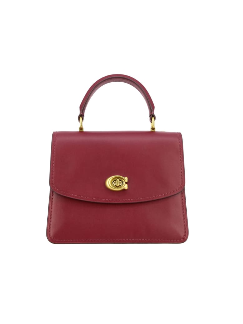 burgundy coach purse