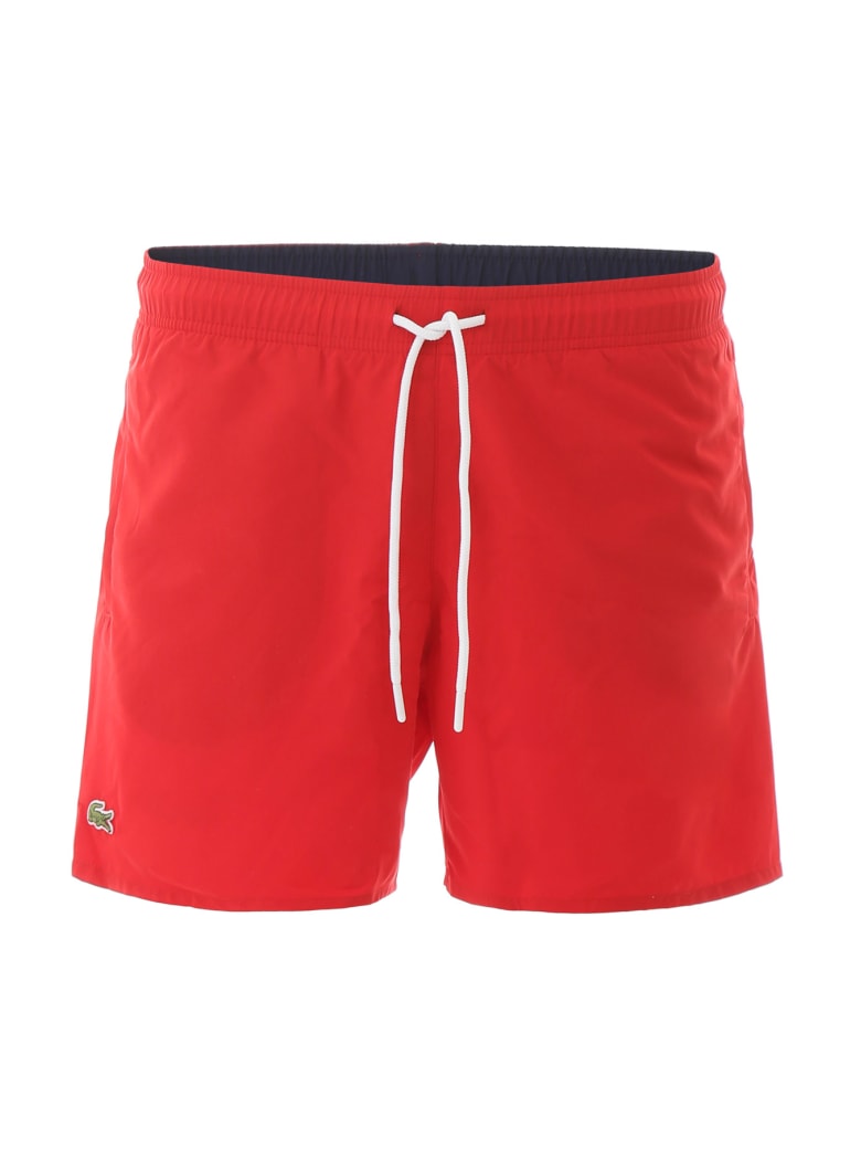 lacoste swim trunks sale