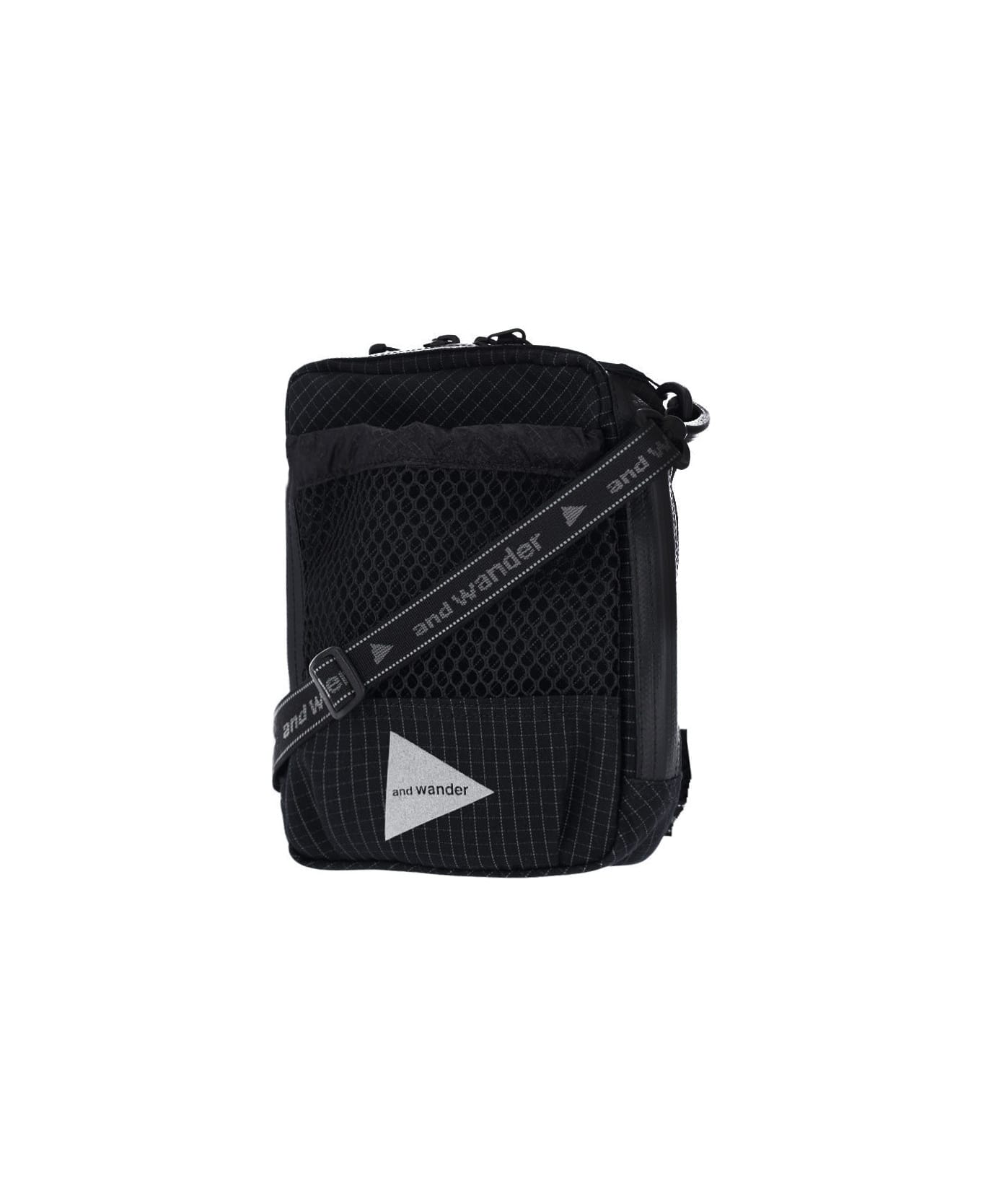 And Wander 
reflective
 Crossbody Pouch Bag - Black  