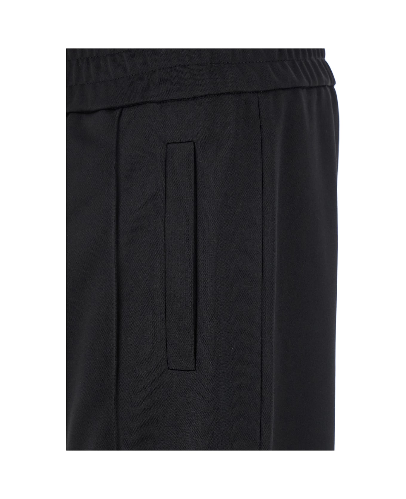 Palm Angels Black Pants With Lettering Logo Printed On The Back In Tech Fabric Man - BLACK
