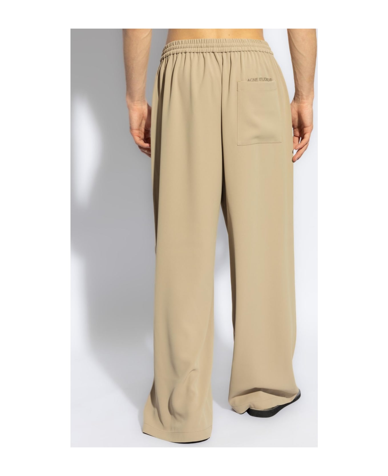 Acne Studios Trousers With Logo - Beige