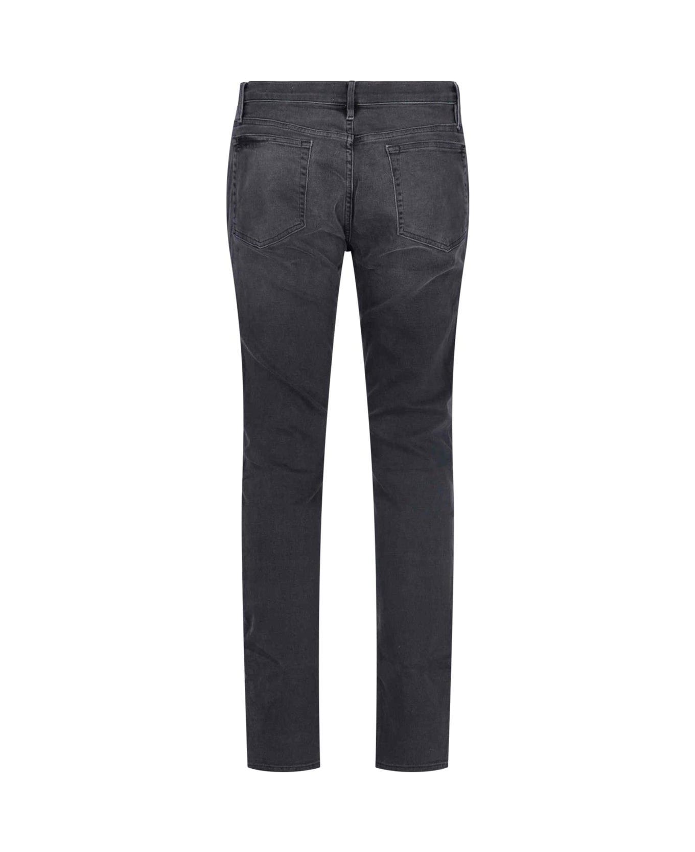 Frame Classic Mid Rise Skinny Jeans