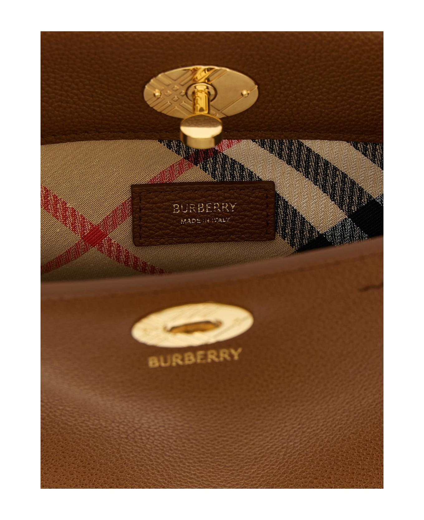 Burberry 
cotswolds 
 Clutch - Brown