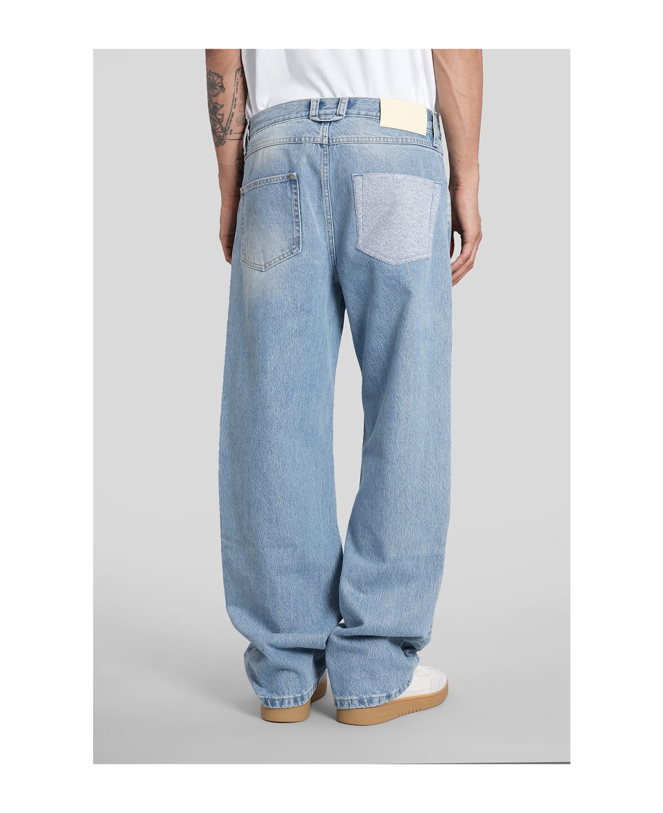 Axel Arigato Zine Embroidered Jeans In Cyan Denim - BLUE
