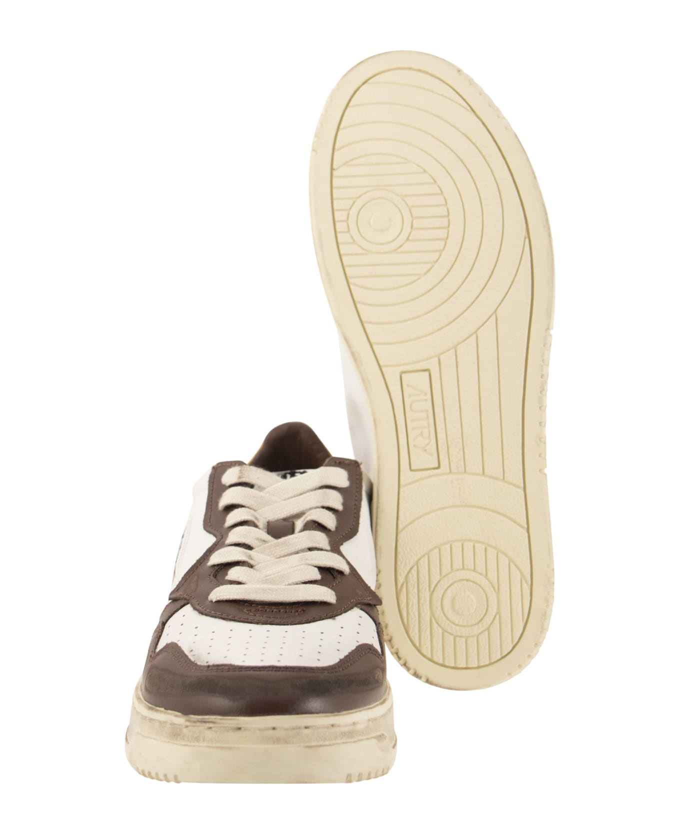 Autry Sneakers In Super Vintage Leather - White