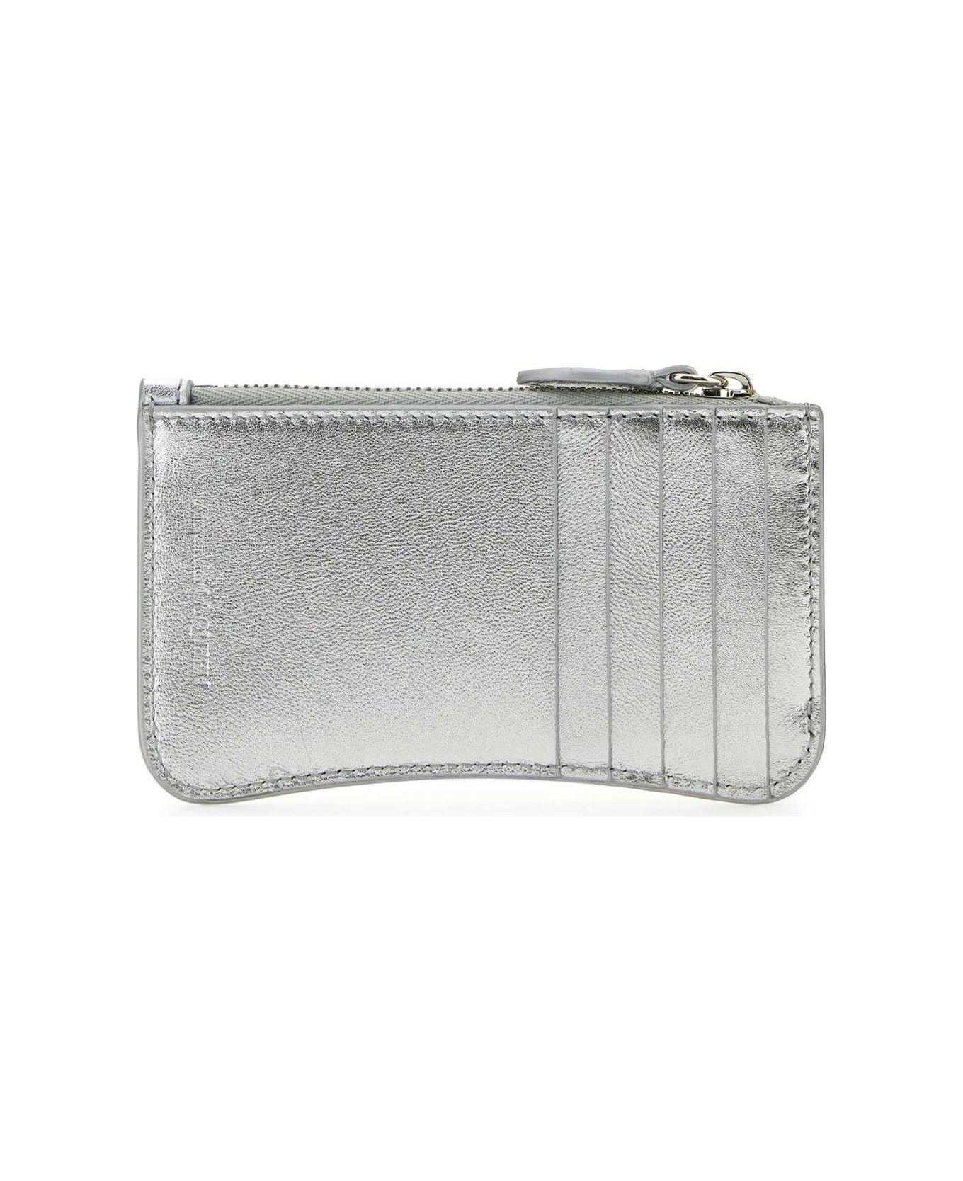 Alexander McQueen Logo Embossed Zipped Wallet - Light silver