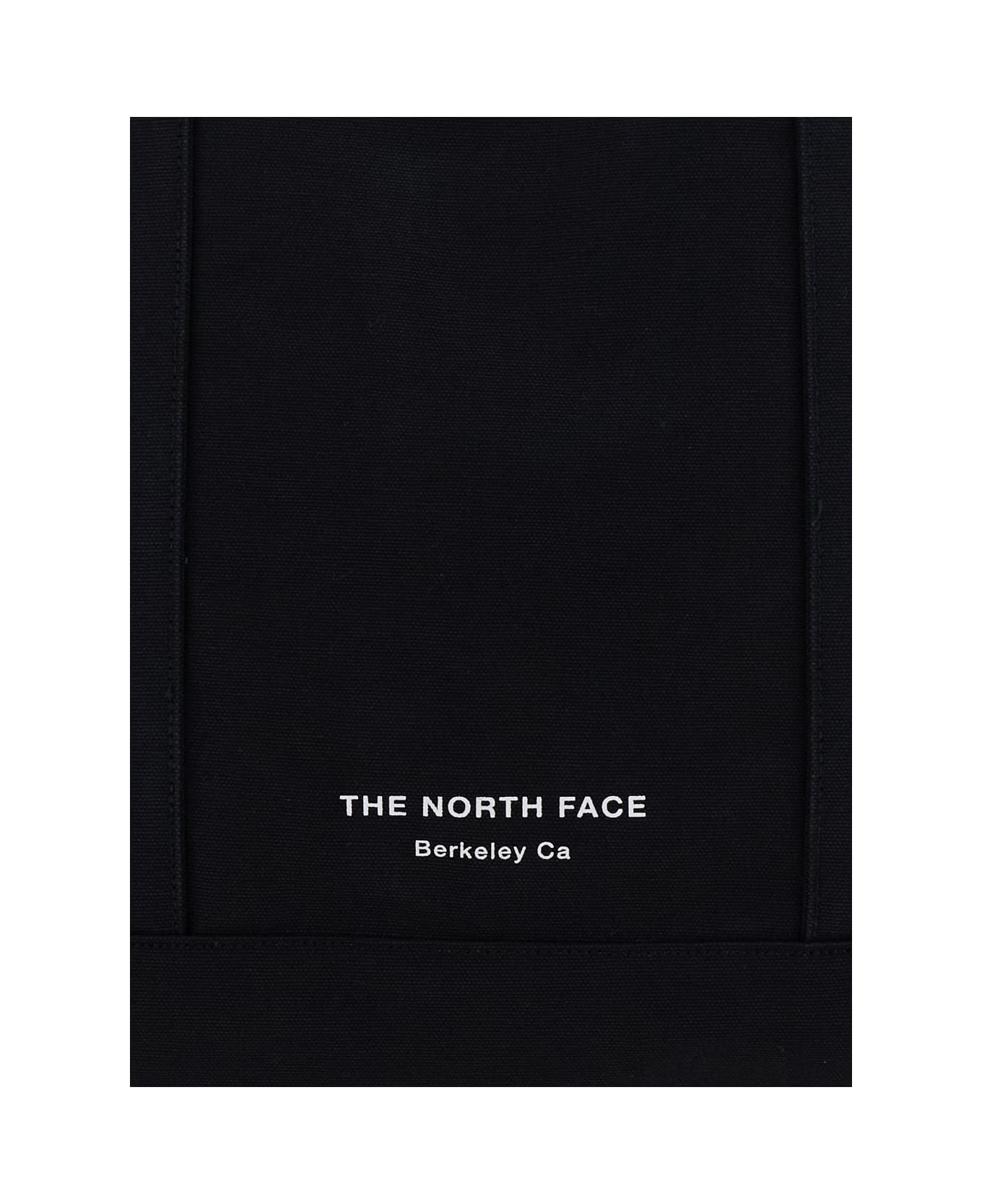 The North Face Black Tote Bag With Two Flat Pockets And Logo Lettering On The Front In Cotton Man - Black