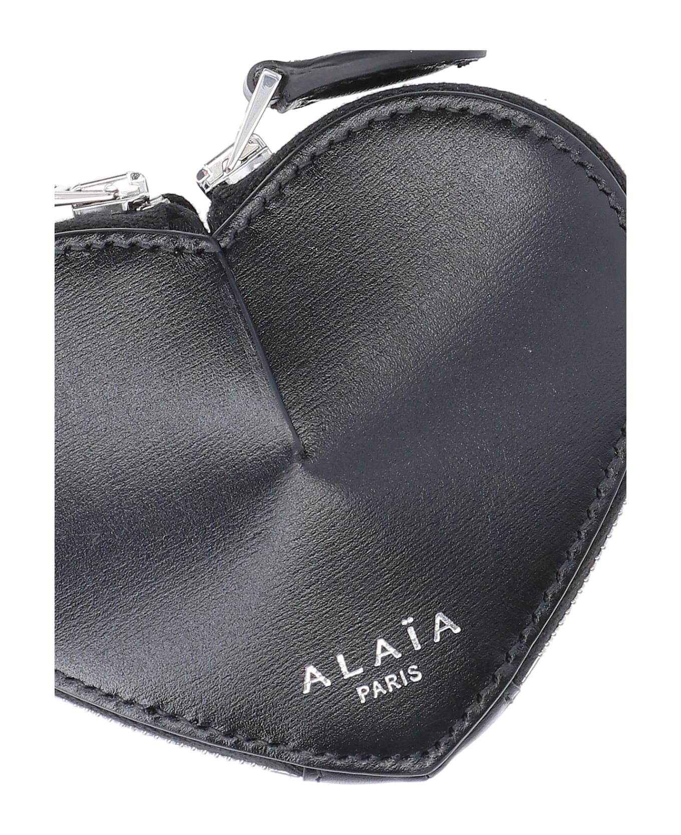 CLN - An elegant understatement. Shop the Alaia wallet