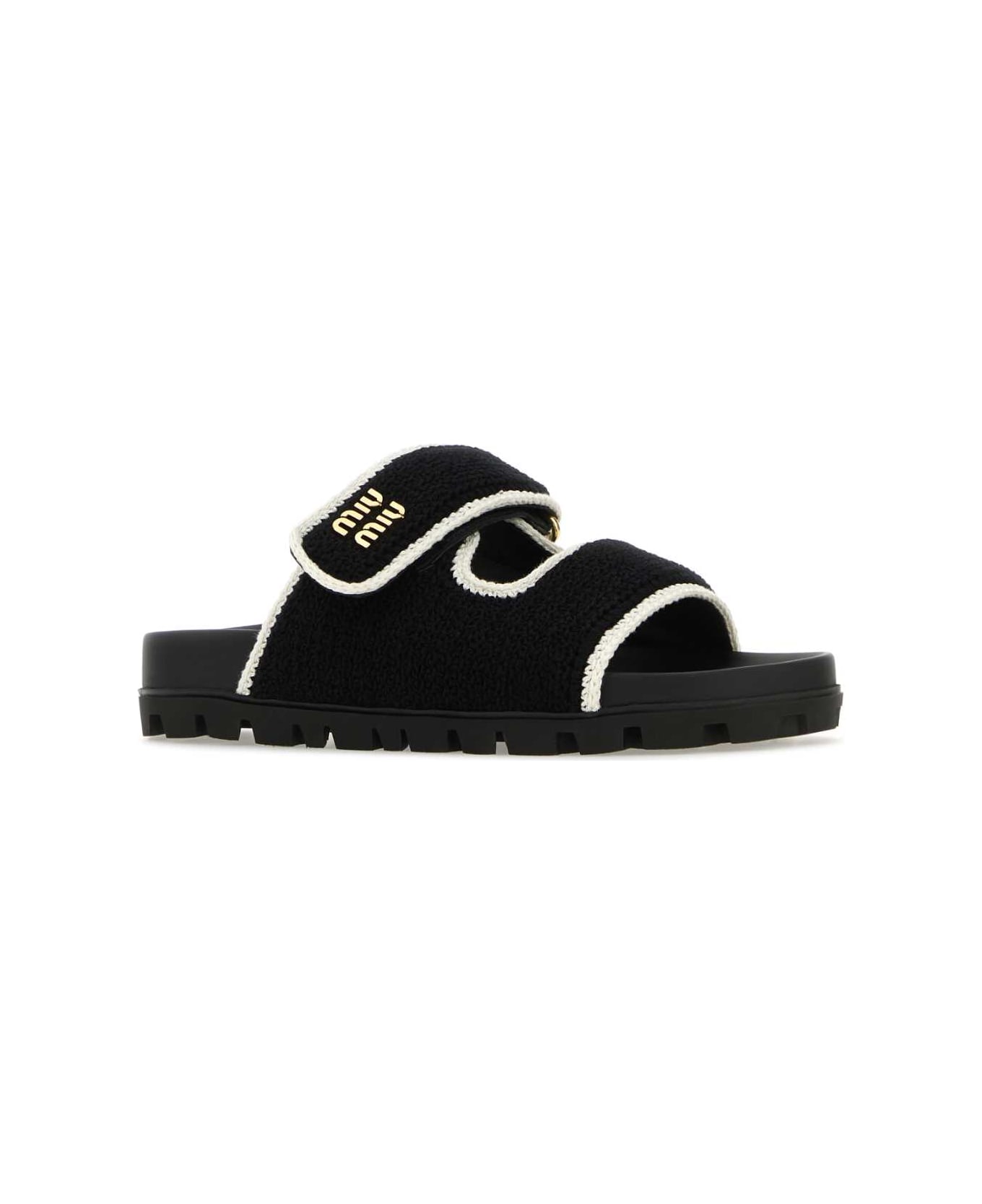 サンダル・ミュール MiuMiu Black nappa leather slippers (5XX605F01088T F0002) Black Leather Slippers | Miu Miu