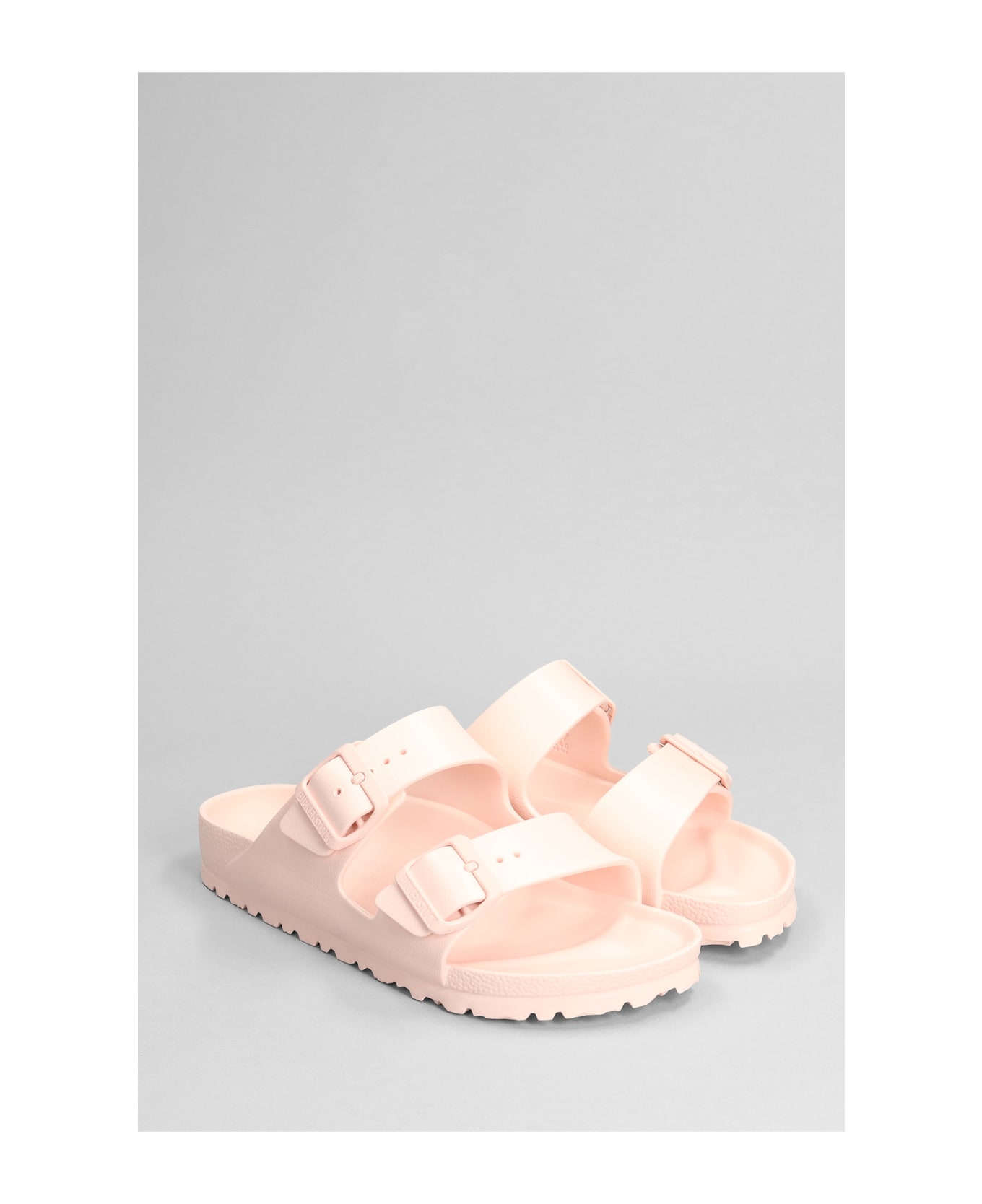Birkenstock Arizona Eva Flats In Rose-pink Rubber/plasic - Rosa