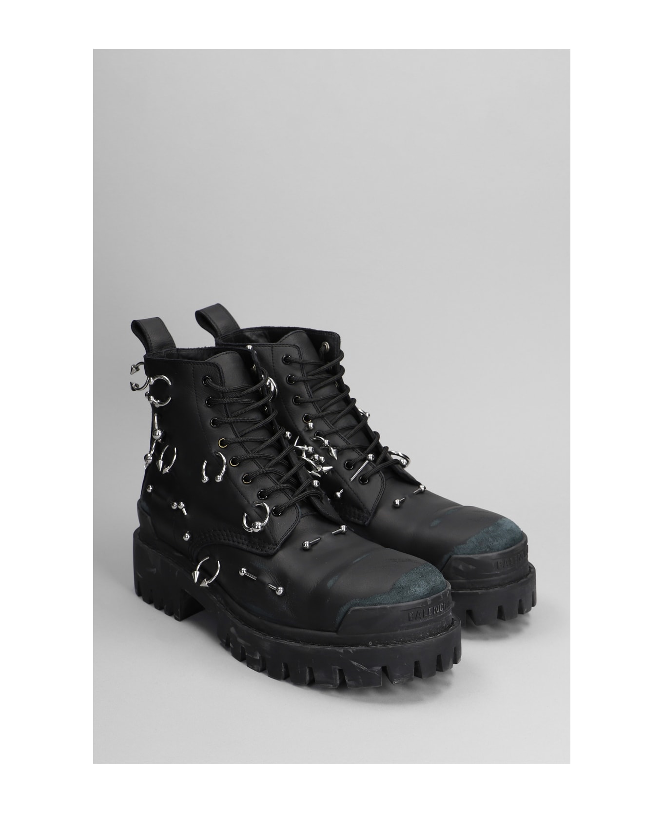 Balenciaga Strike Piercing Combat Boots In Black Leather