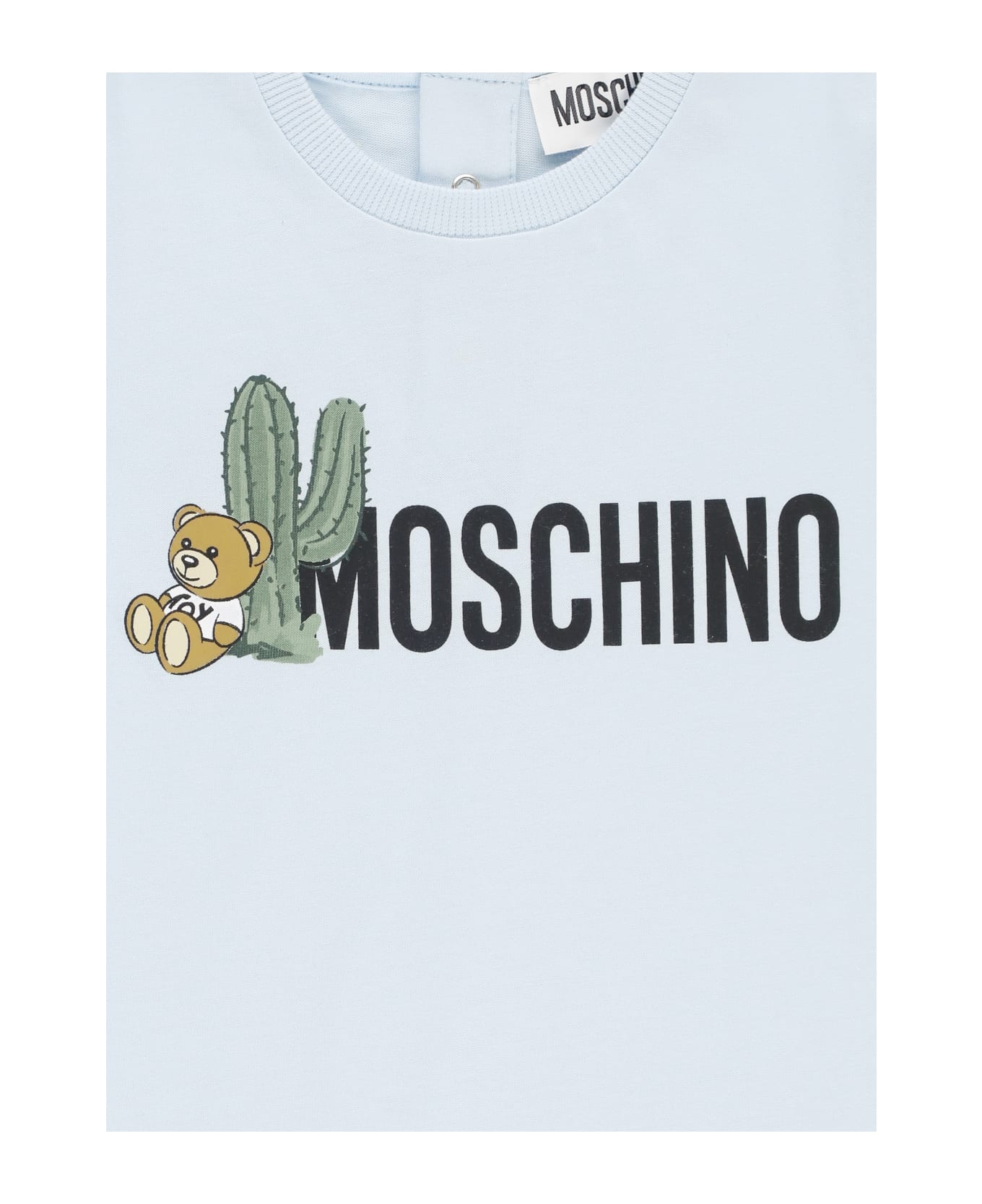 Moschino Jumpsuit With Logo - Light Blue