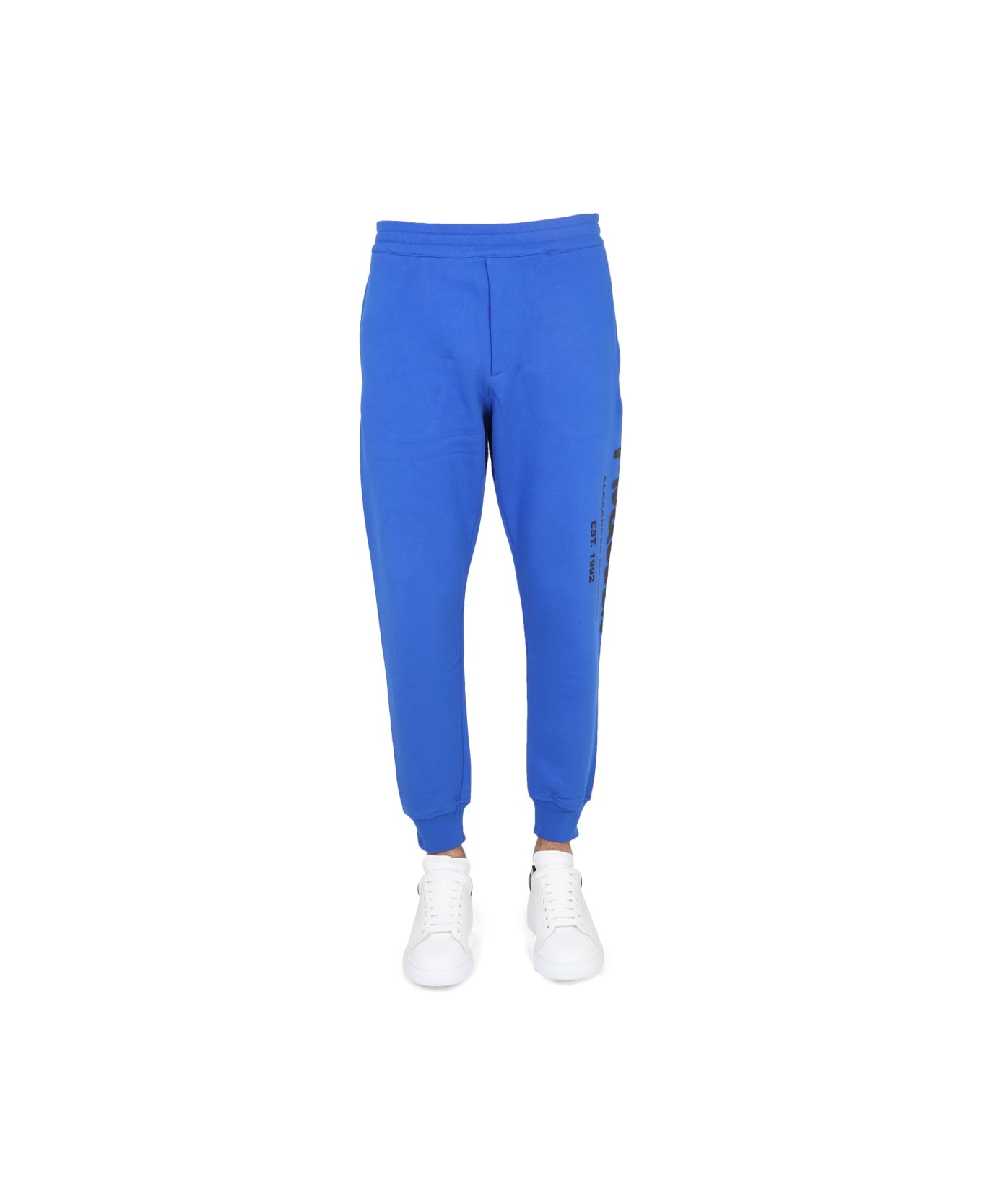 Alexander McQueen Jogging Pants With Graffiti Logo - BLUE