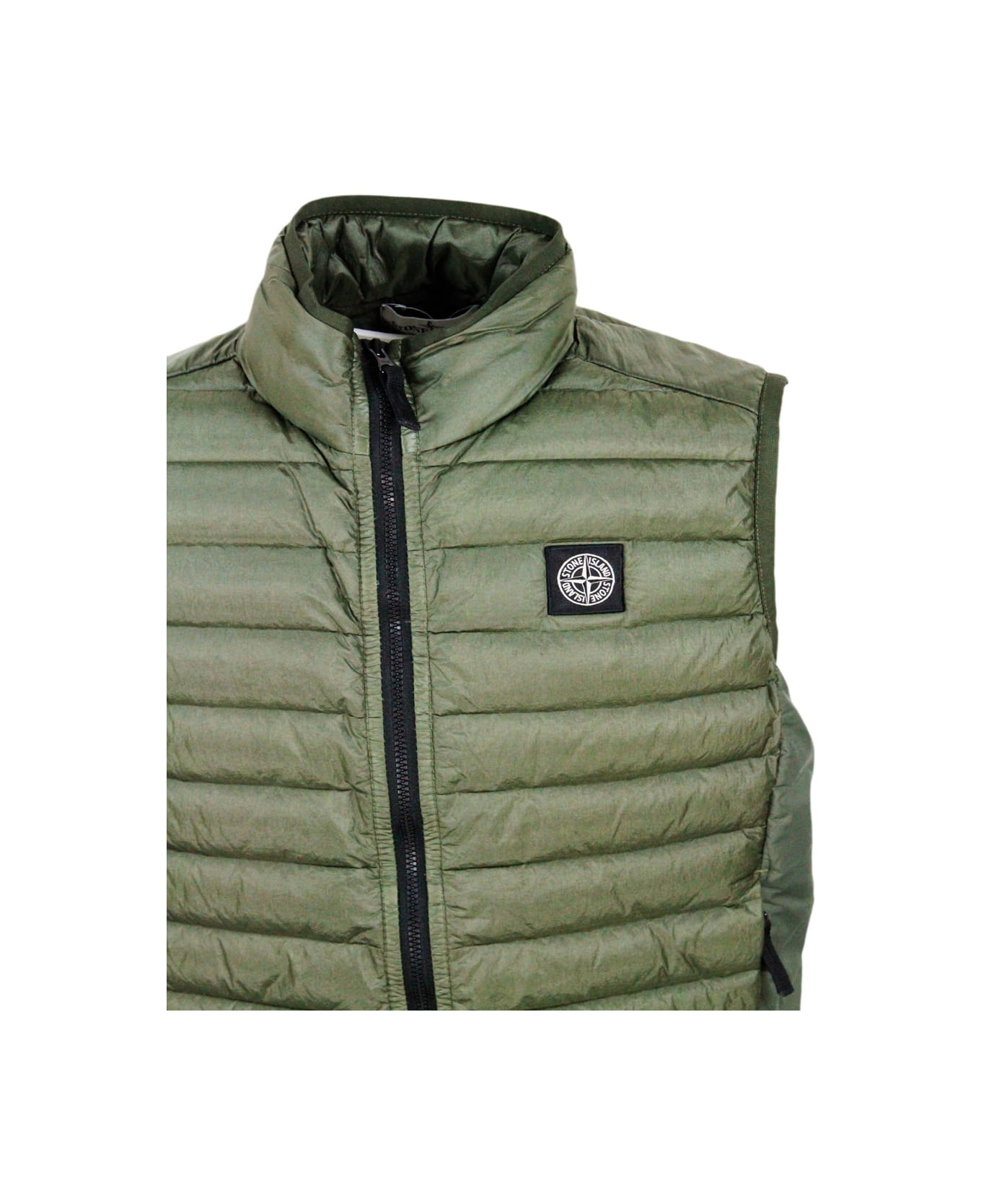 Stone Island Junior 100 Gram Padded Sleeveless Down Vest Made Of Recycled Crisp Nylon. Zip Closure And Logo On The Chest - Military