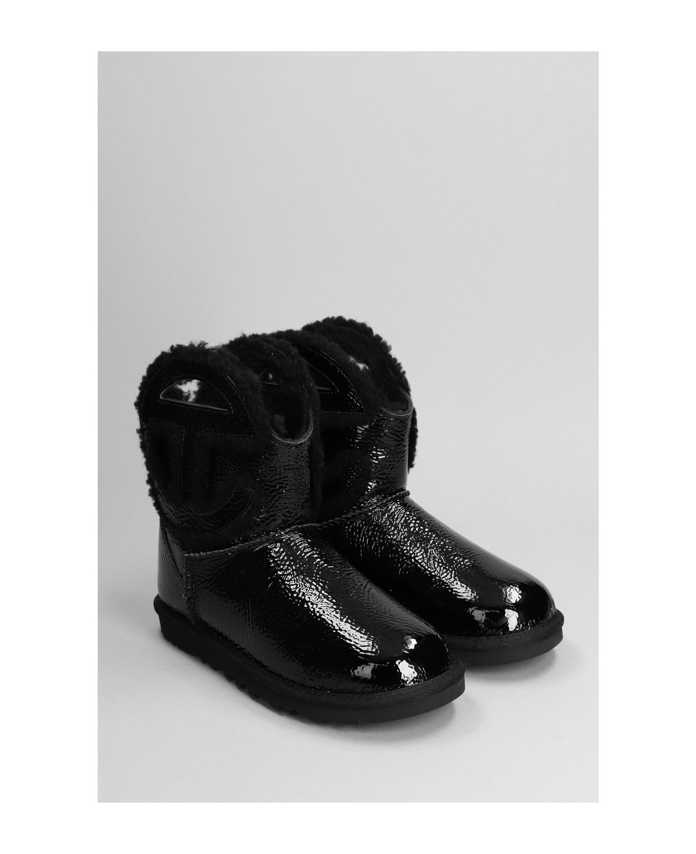 UGG Logo Mini Crinkle Low Heels Ankle Boots In Black Leather - Black