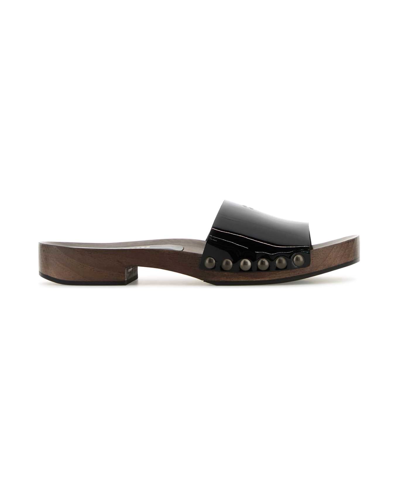 Miu Miu Black Leather Clogs - NERO