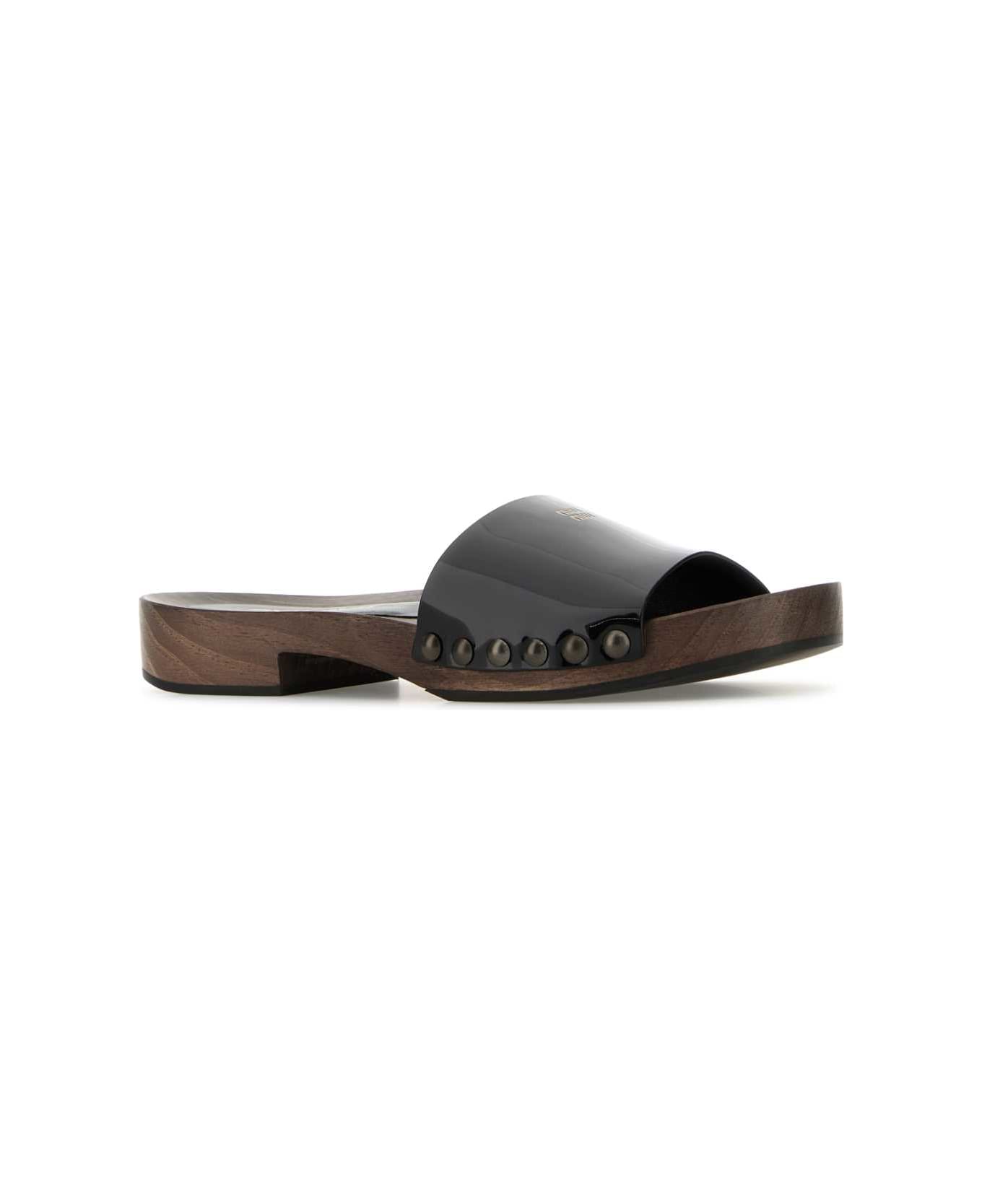 Miu Miu Black Leather Clogs - NERO