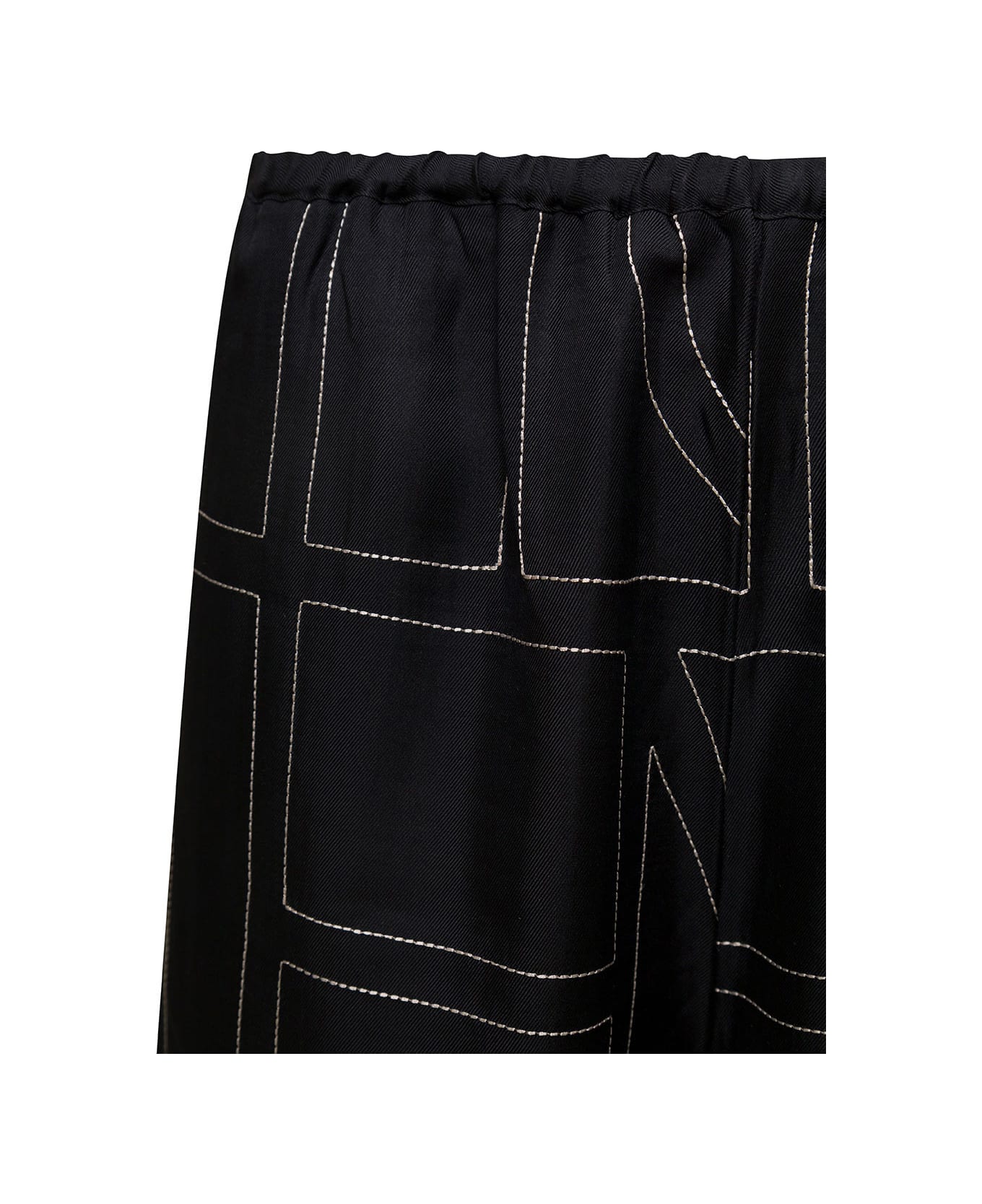 Totême Black Loose Pants With Monogram Print In Silk Woman - Nero