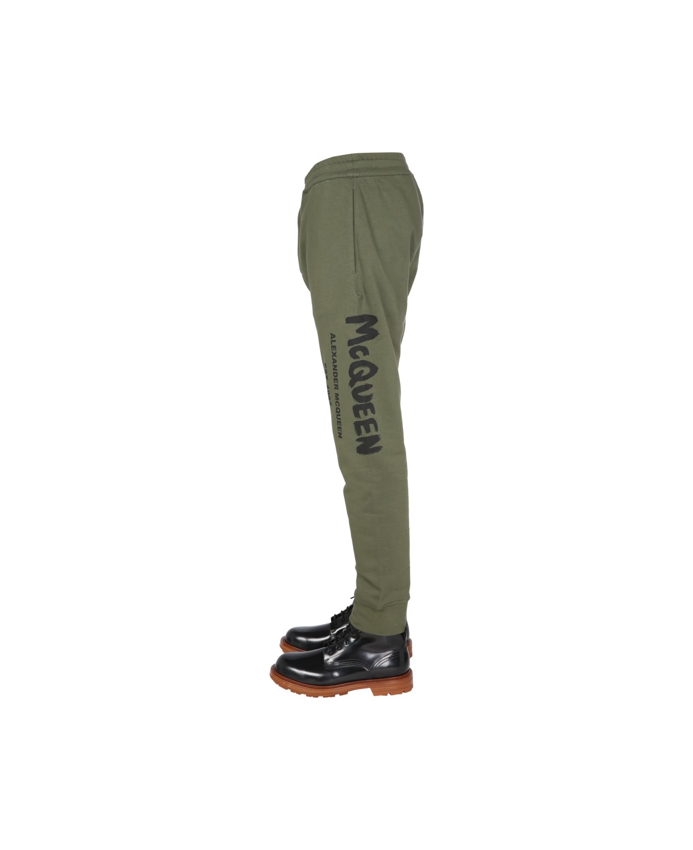 Alexander McQueen Jogging Pants With Graffiti Logo - BROWN