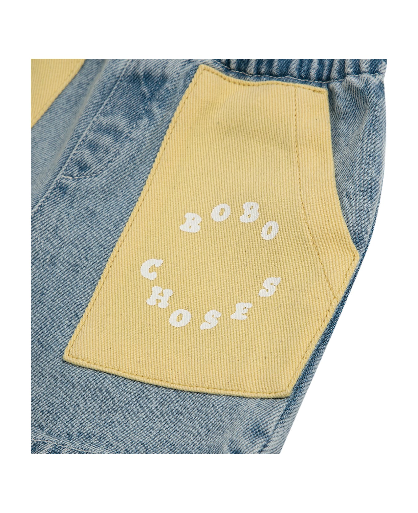 Bobo Choses Denim Shorts For Baby Boy With Yellow Pockets And Logo - Denim