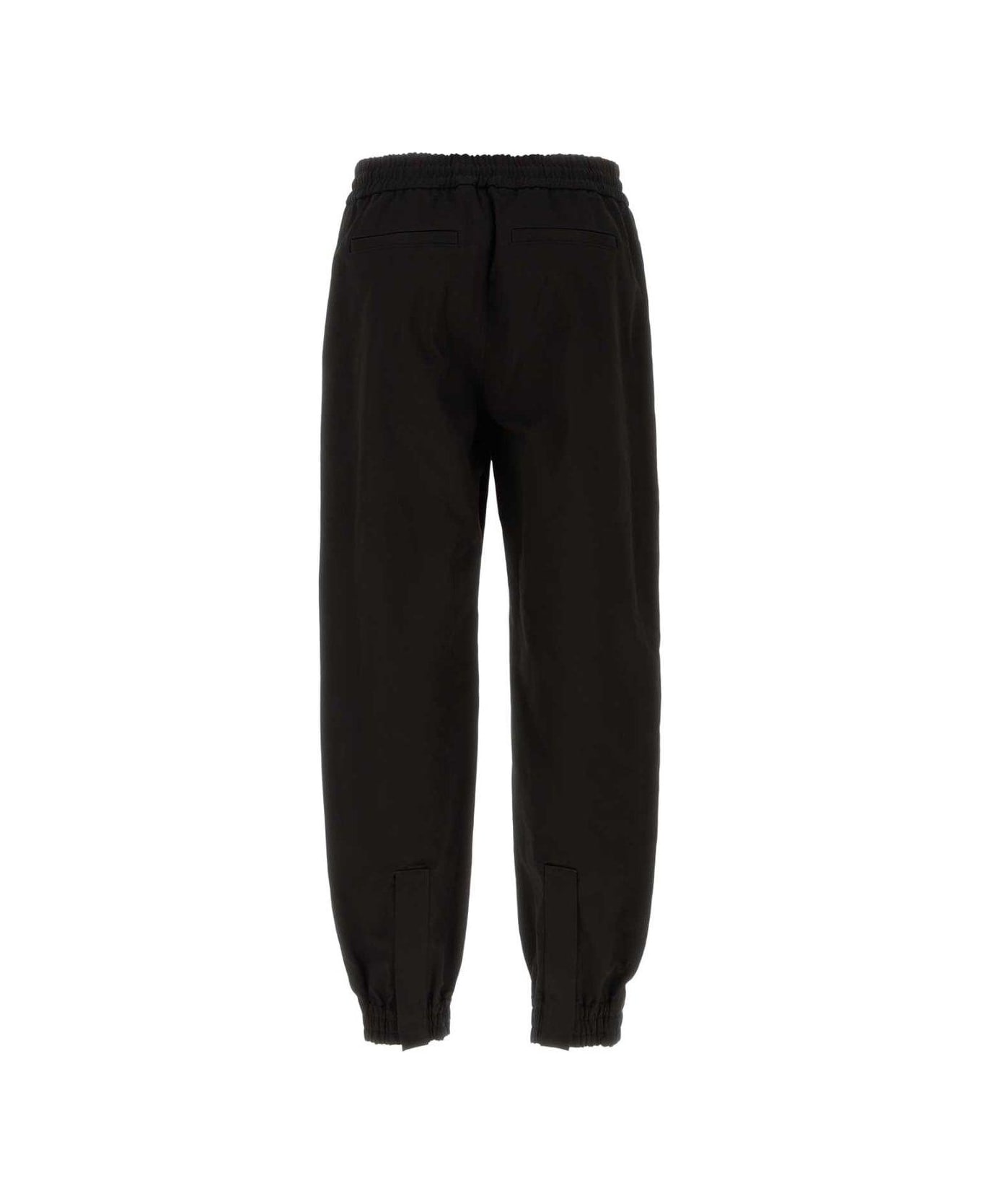 Alexander McQueen Mid-rise Tapered-leg Trousers - BLACK