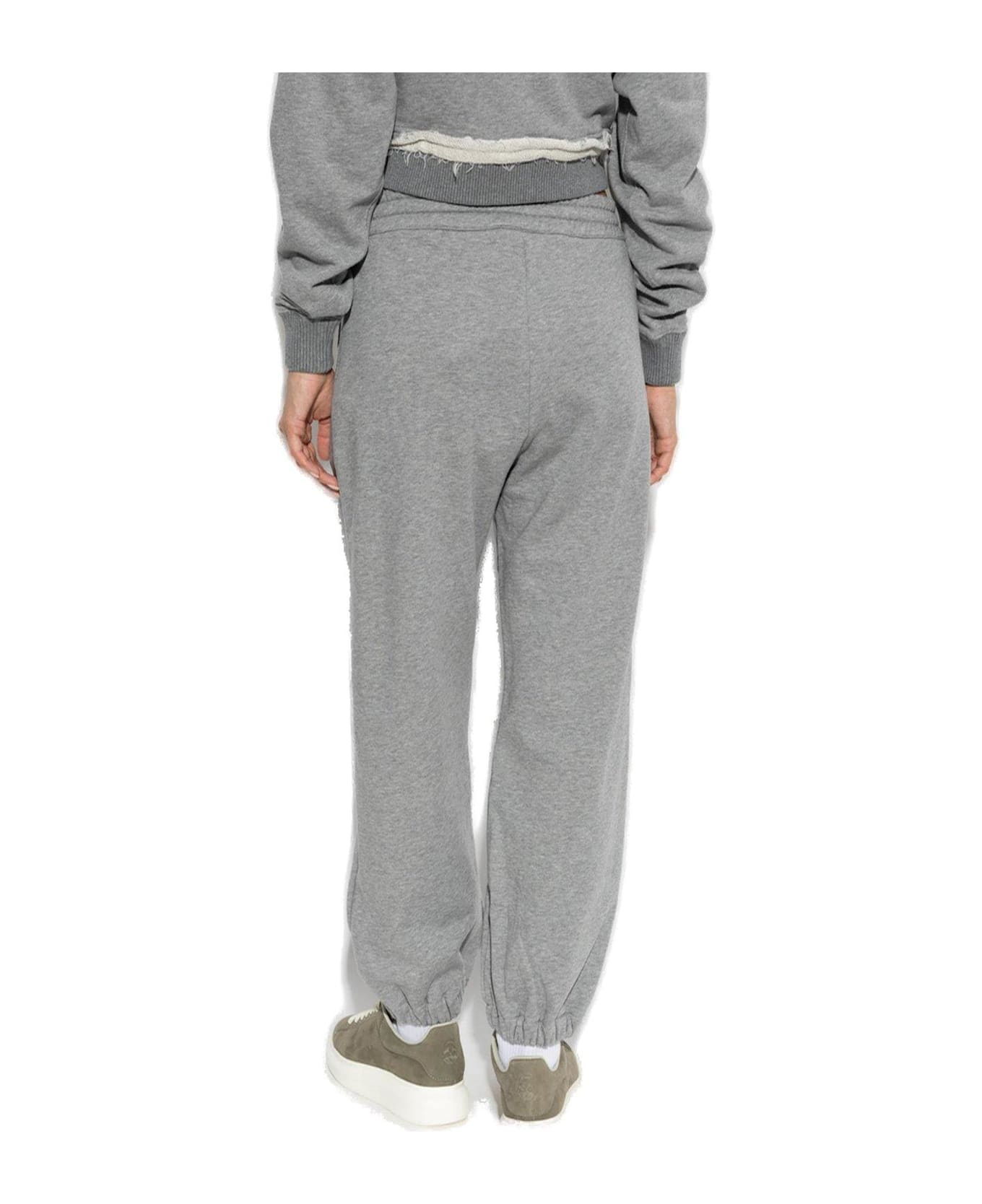 Alexander McQueen Skull Embroidered Tapered Sweatpants - Grey
