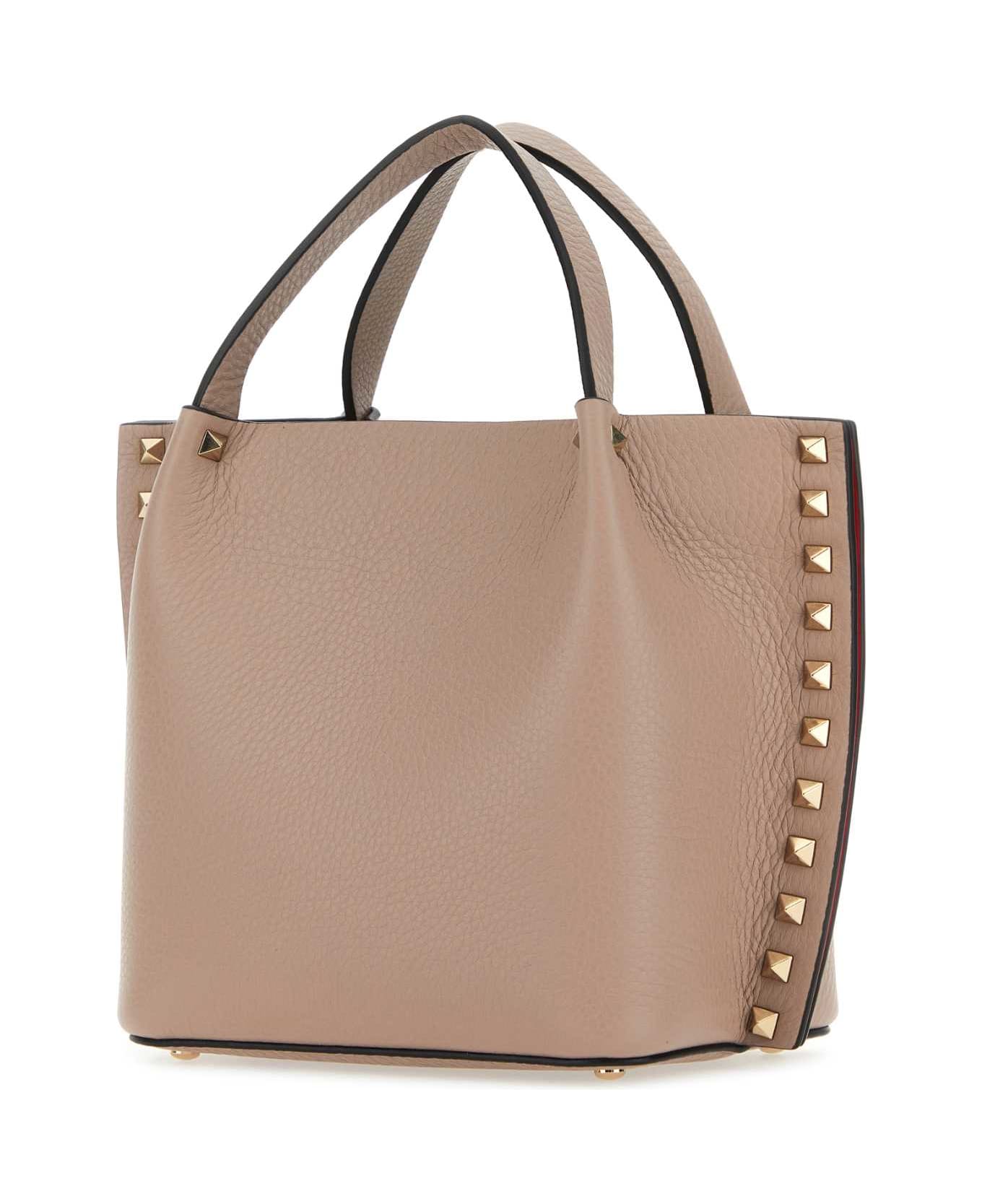 Valentino Garavani Antiqued Pink Leather Rockstud Handbag - POUDRE