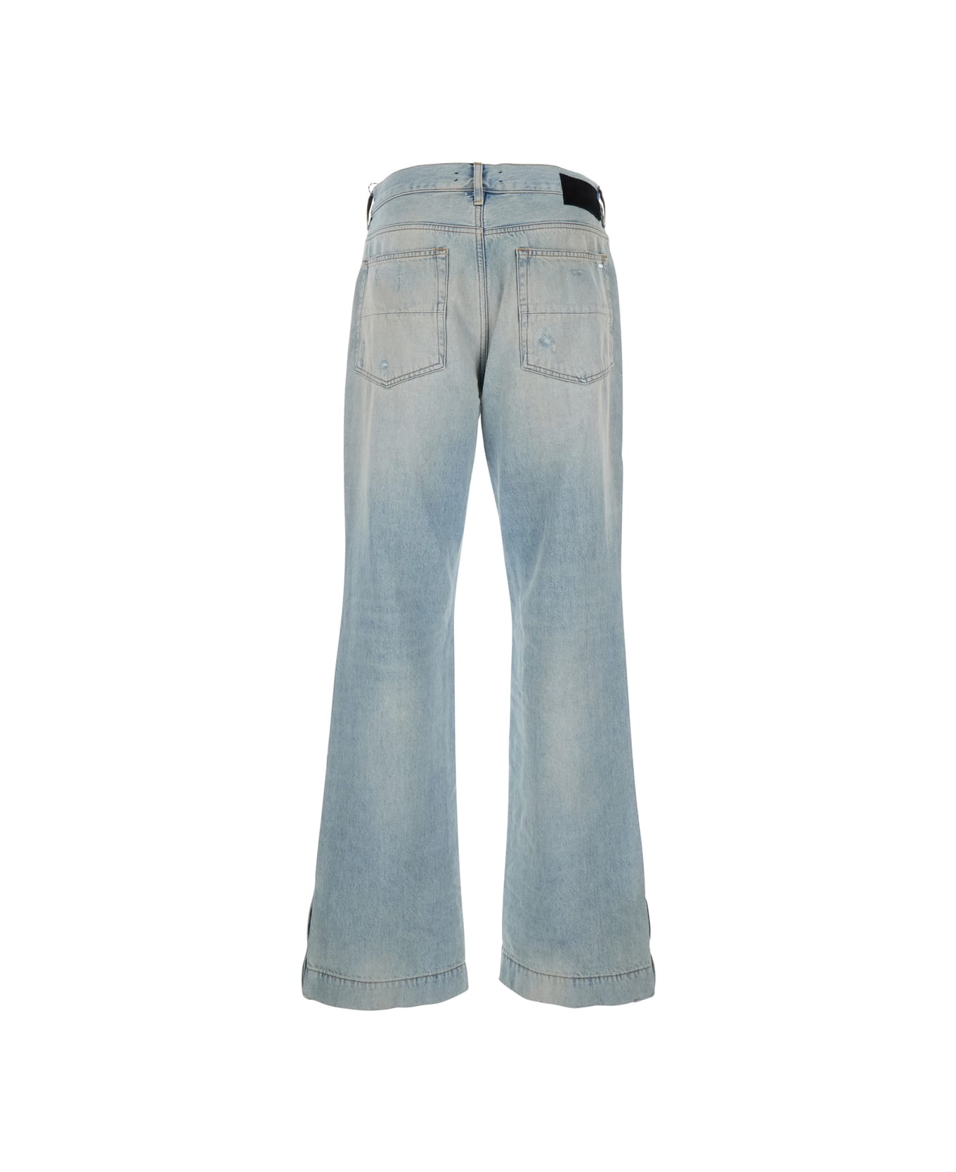AMIRI Light Bliue Jeans With Flared Leg And Ripped Details In Denim Man - Light blue