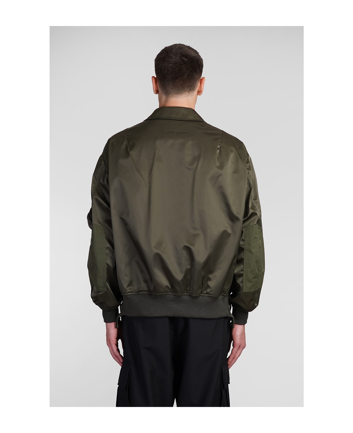 Comme des Garçons Homme Bomber In Green Nylon - green