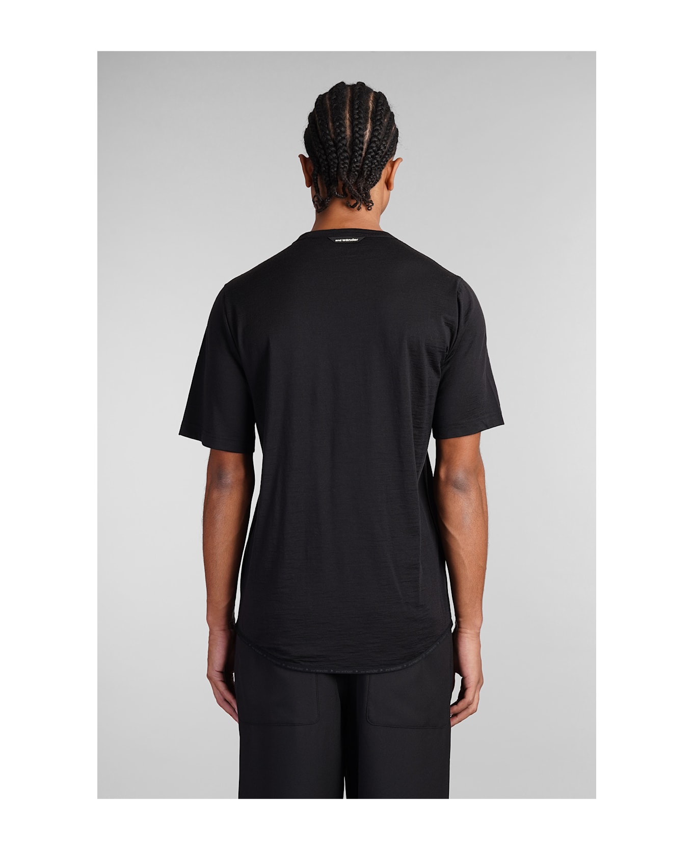 And Wander T-shirt In Black Wool - black