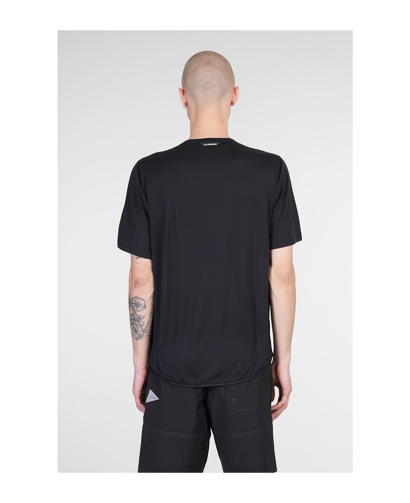 And Wander T-shirt In Black Wool - black