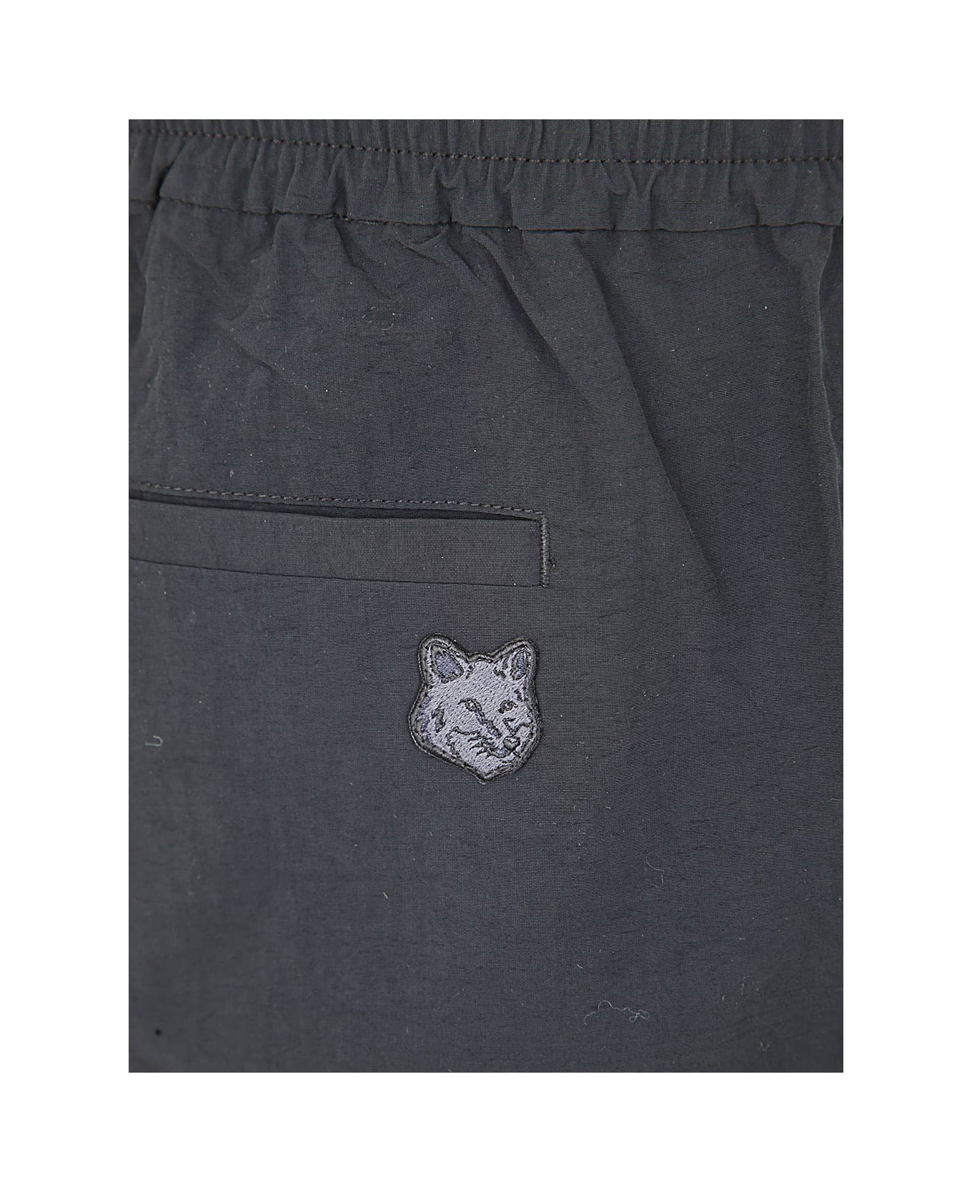 Maison Kitsuné City Pants In Crispy Nylon With Tonal Fox Head Pat - Black ボトムス