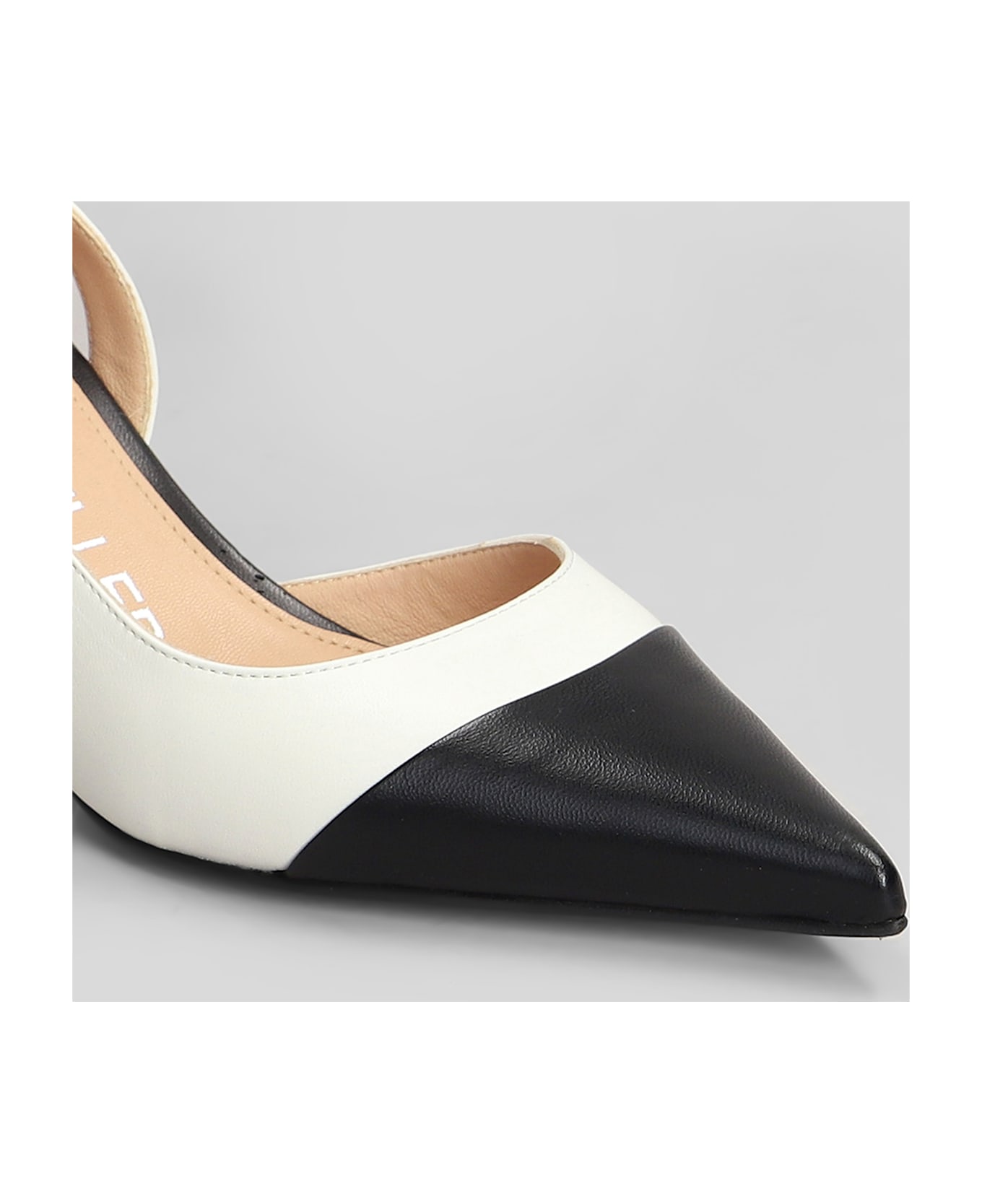 The Seller Pumps In Black Leather - black