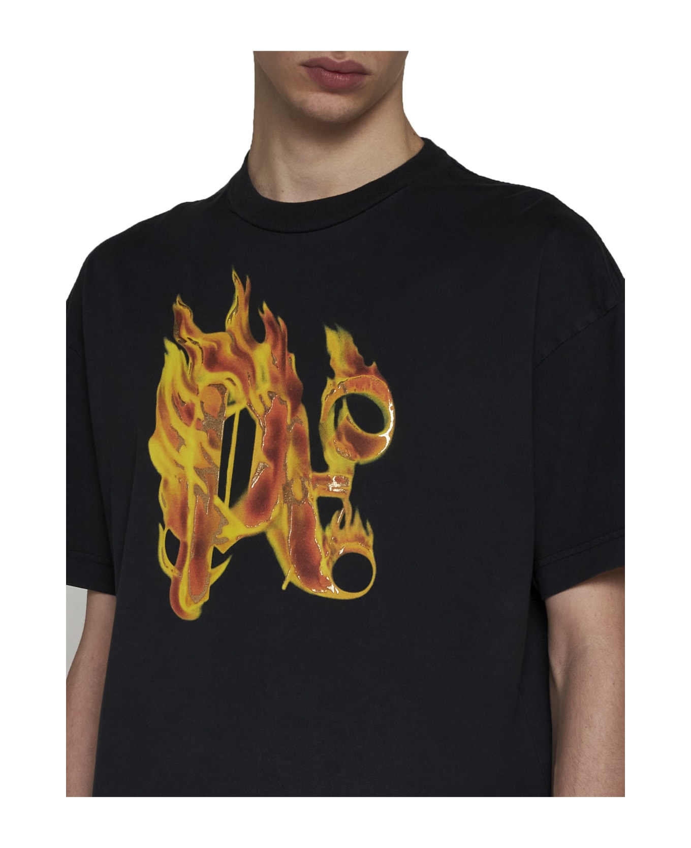 Palm Angels T-shirt With Burining Monogram On The Front - Black gold