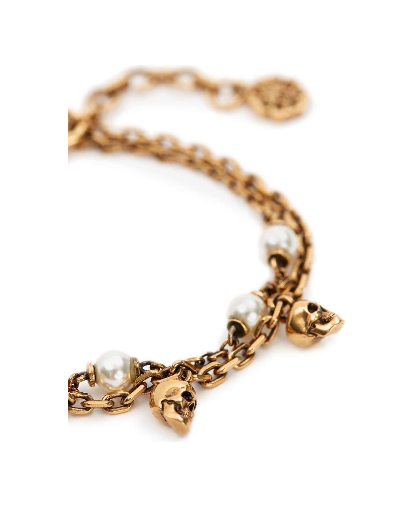 Alexander McQueen Skull Pearl Embellished Bracelet - Oro