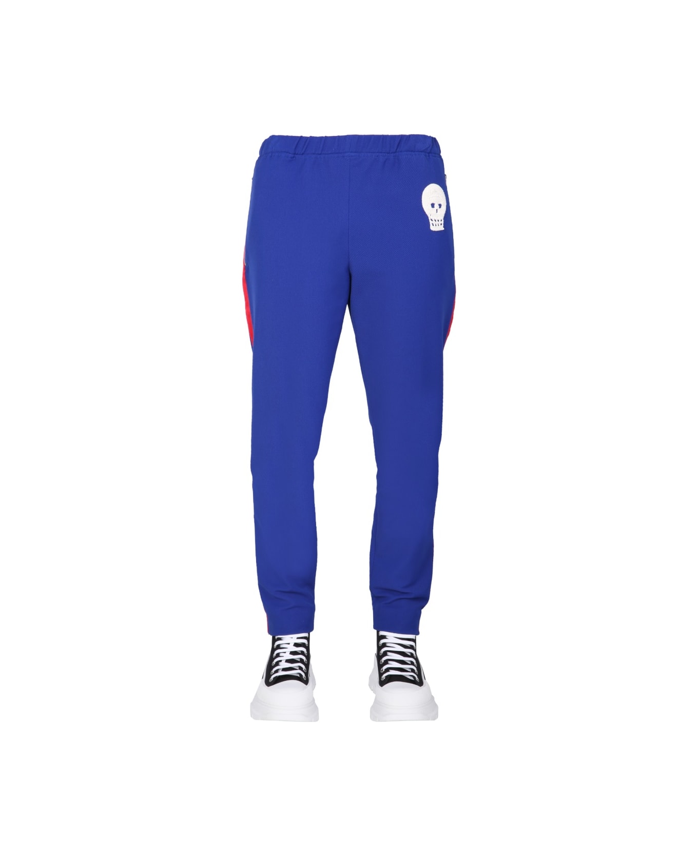 Alexander McQueen Jogging Pants With Embroidered Skull - BLUE