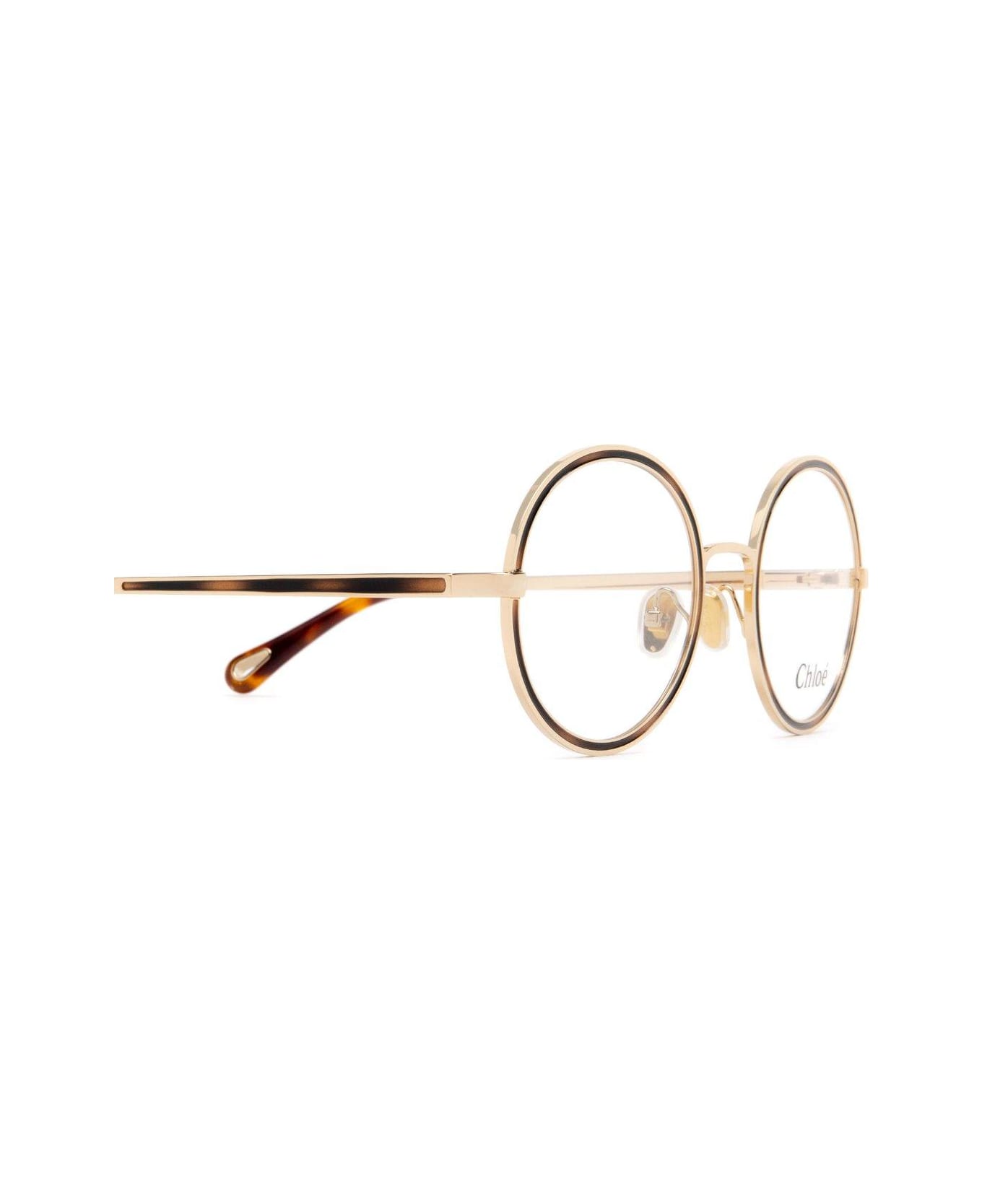 Chloé Eyewear Round Frame Glasses - 002 gold gold transparent