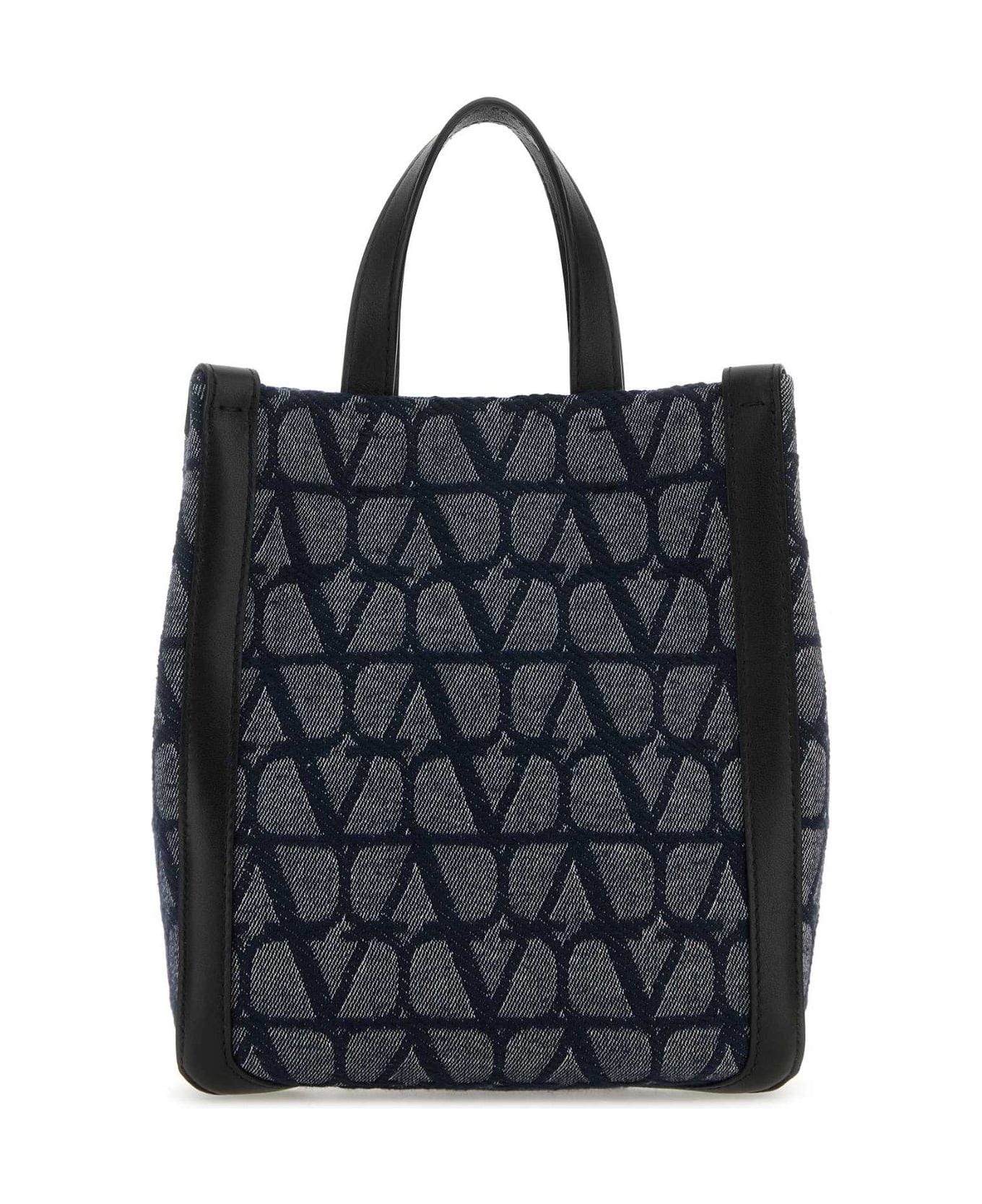 Valentino Garavani All-over Logo Patterned Top Handle Bag - MELANGEDENIMNERO